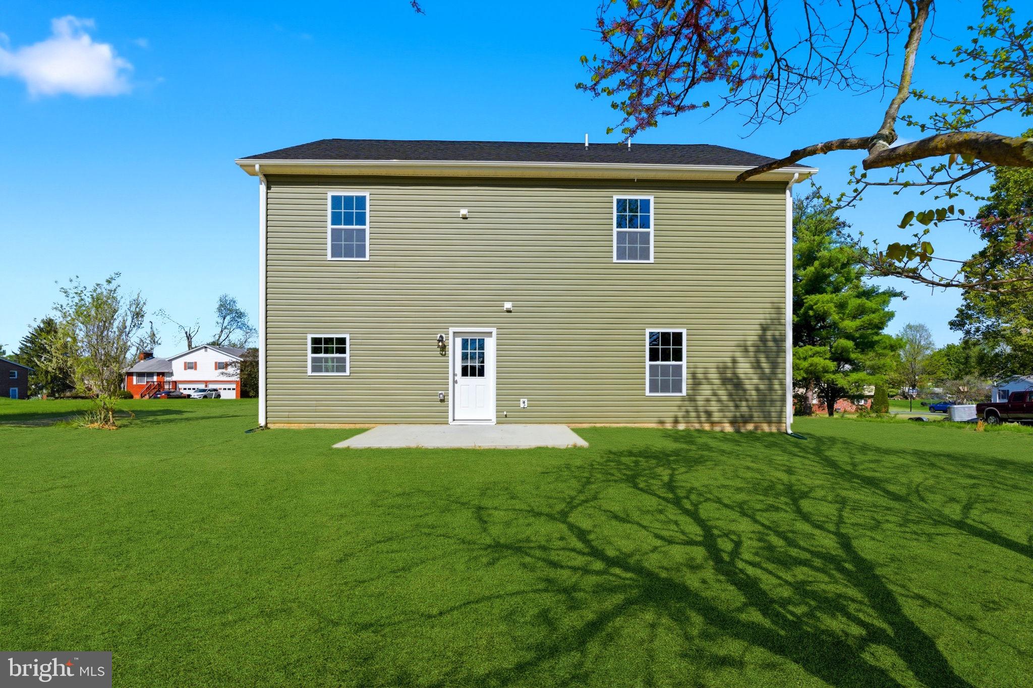 152 General Lee Avenue Inwood, WV 25428 - Photo 43 of 47 a front view of the house with garden