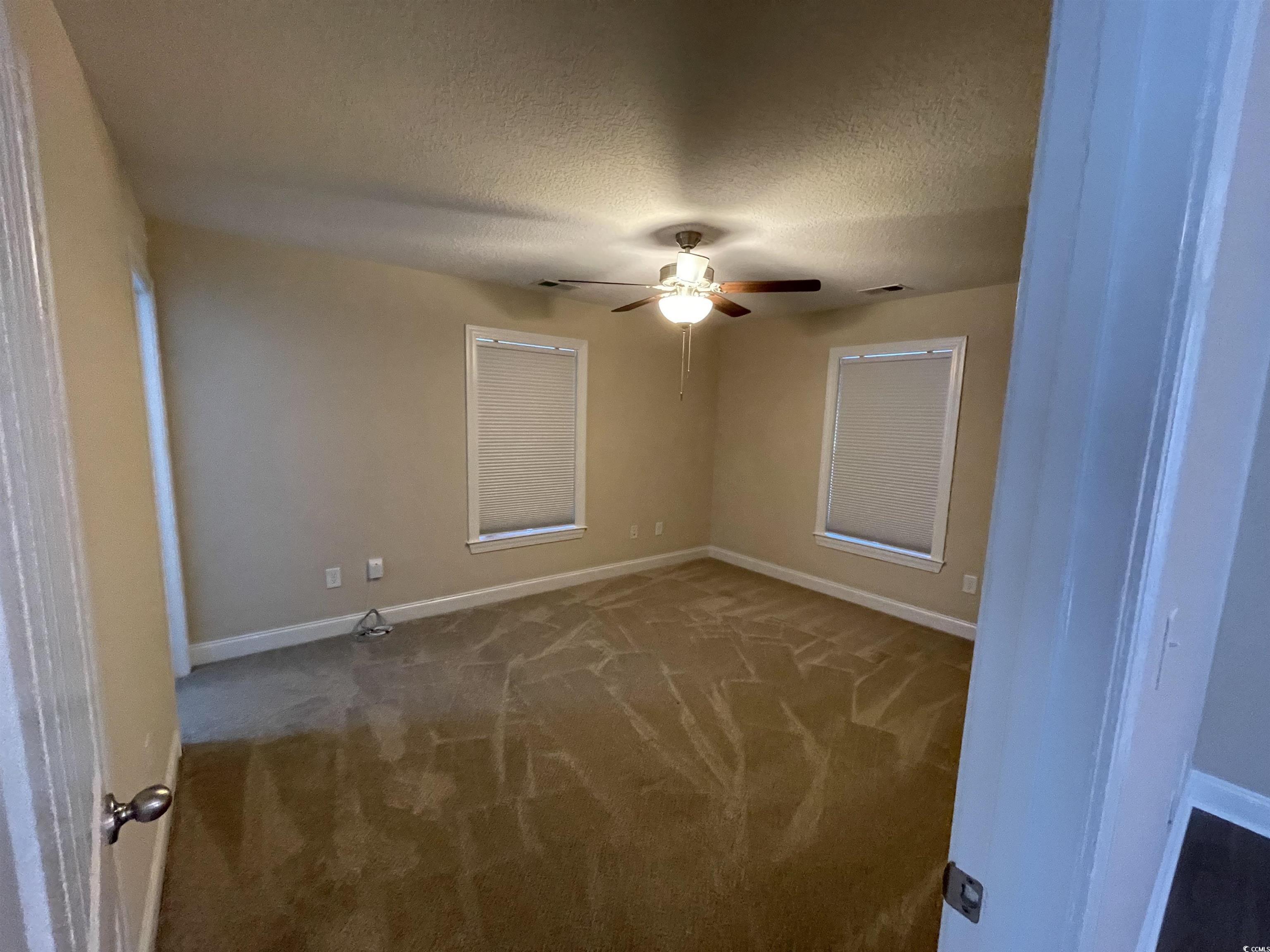 6765 Highway 66 Loris, SC 29569 - Photo 11 of 20 Unfurnished room featuring visible vents, baseboar