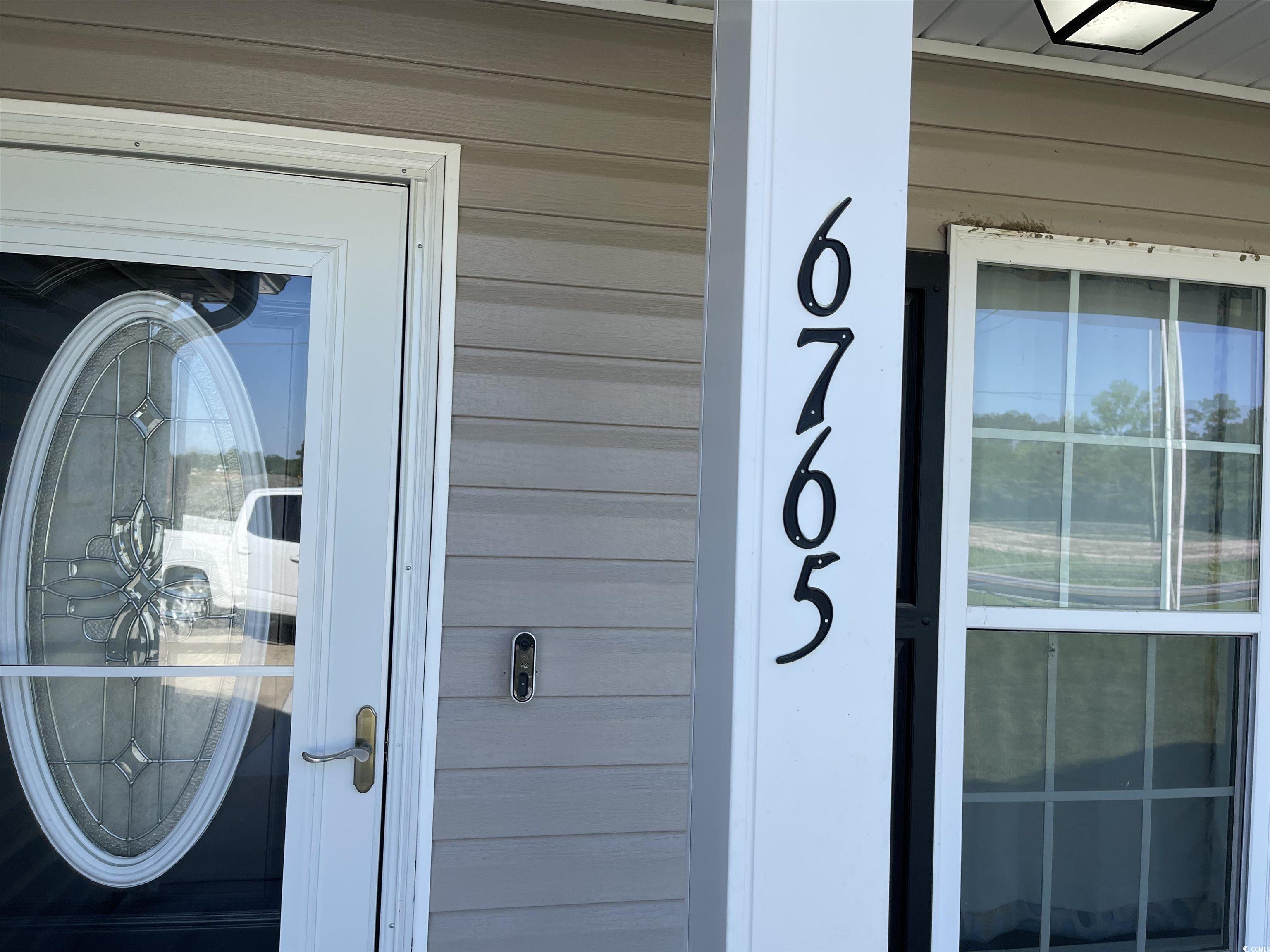 6765 Highway 66 Loris, SC 29569 - Photo 6 of 20 View of exterior details with house number