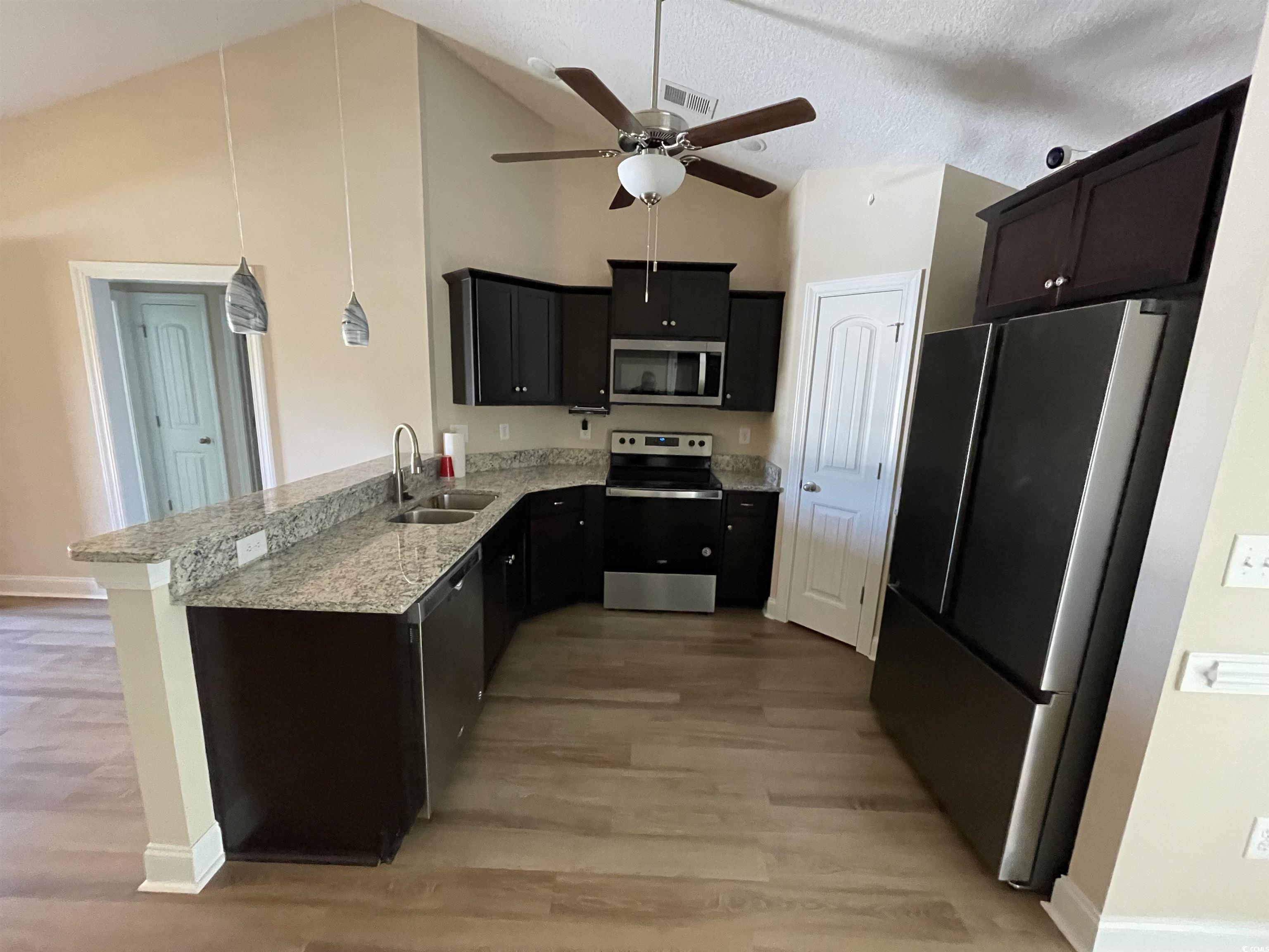 6765 Highway 66 Loris, SC 29569 - Photo 8 of 20 Kitchen with visible vents, hanging light fixtures