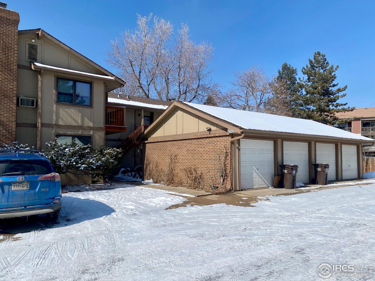 4885 Eisenhower Drive Boulder, CO 80303 - Photo 2 of 9 a view of a house with a yard
