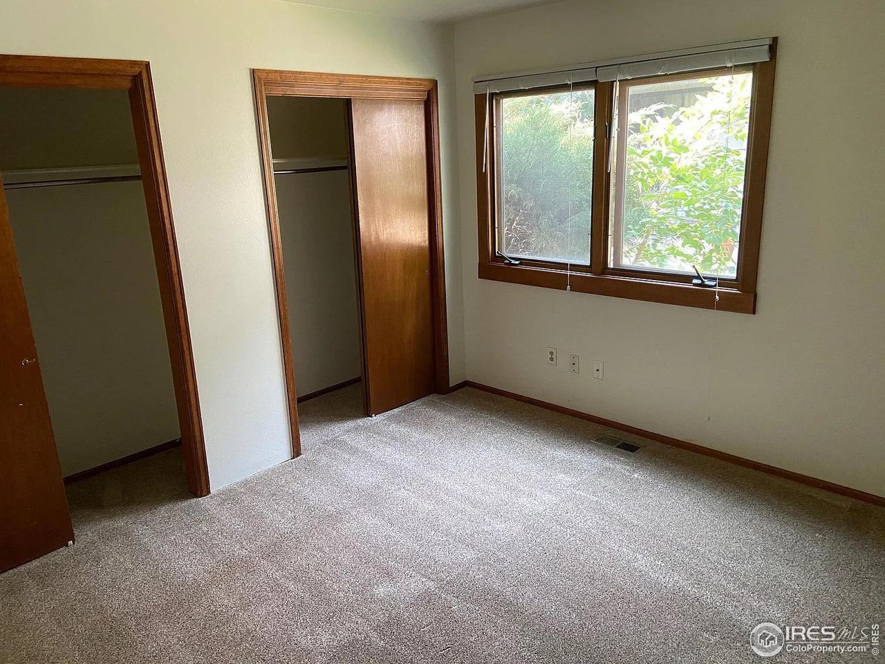 4885 Eisenhower Drive Boulder, CO 80303 - Photo 5 of 9 a view of an empty room with a window