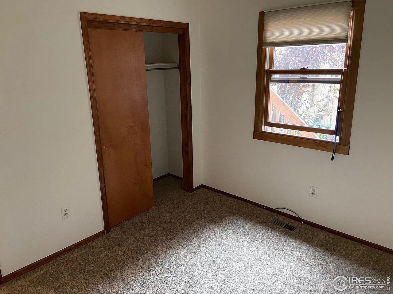 4885 Eisenhower Drive Boulder, CO 80303 - Photo 6 of 9 an empty room with windows