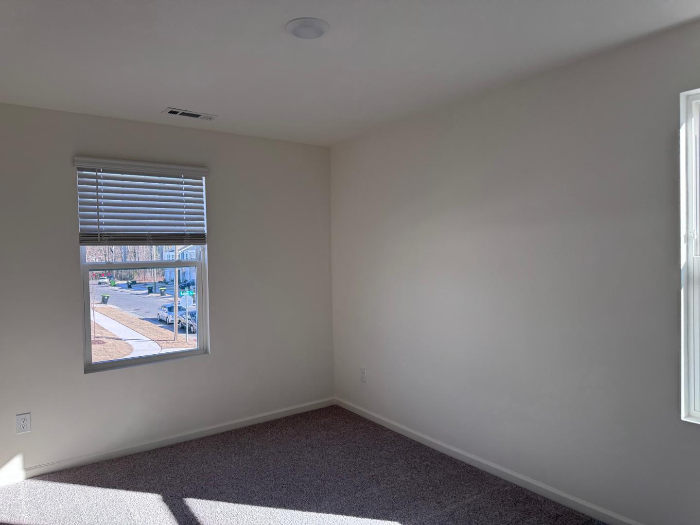 2002 Trailside Drive Durham, NC 27704 - Photo 13 of 14 an empty room with windows
