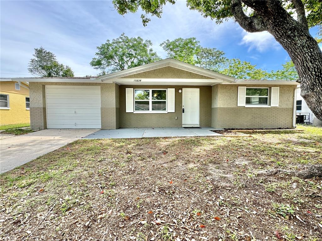10834 Premier Avenue Port Richey, FL 34668 - Photo 1 of 1 Welcome home!