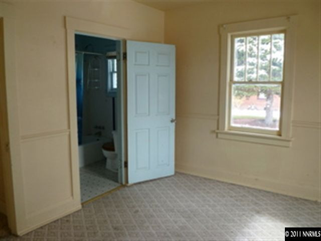 760 Mill Street Reno, NV 89502 - Photo 3 of 5 an empty room that has a window