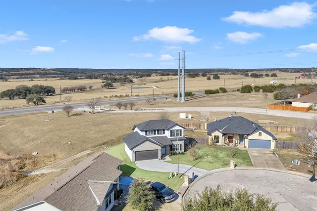 a view of a terrace with chairs