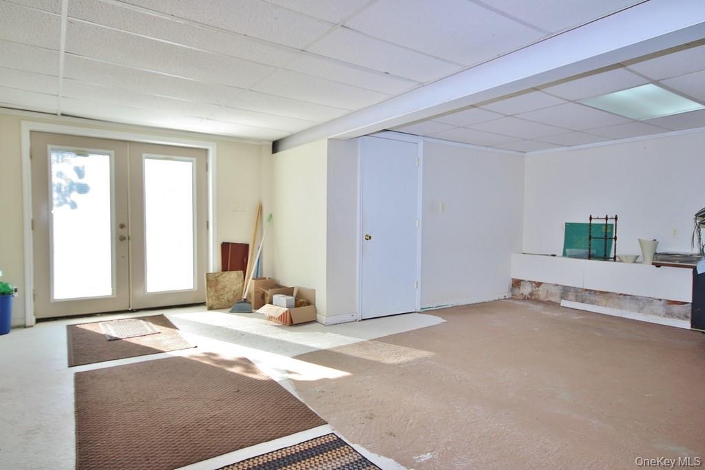 491 Hurd Road Swan Lake, NY 12783 - Photo 18 of 30 a view of an empty room with window