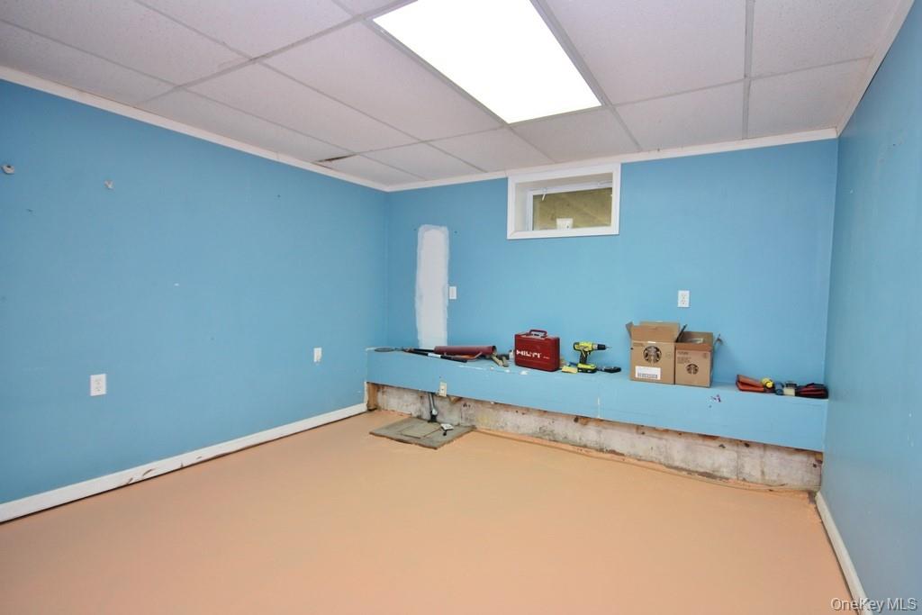 491 Hurd Road Swan Lake, NY 12783 - Photo 19 of 30 a room with a desk and chair