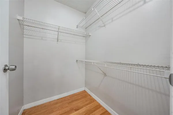 a view of a room with racks on the wall