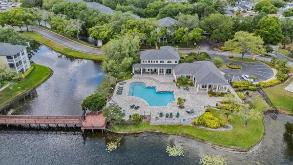 an aerial view of a house with a garden