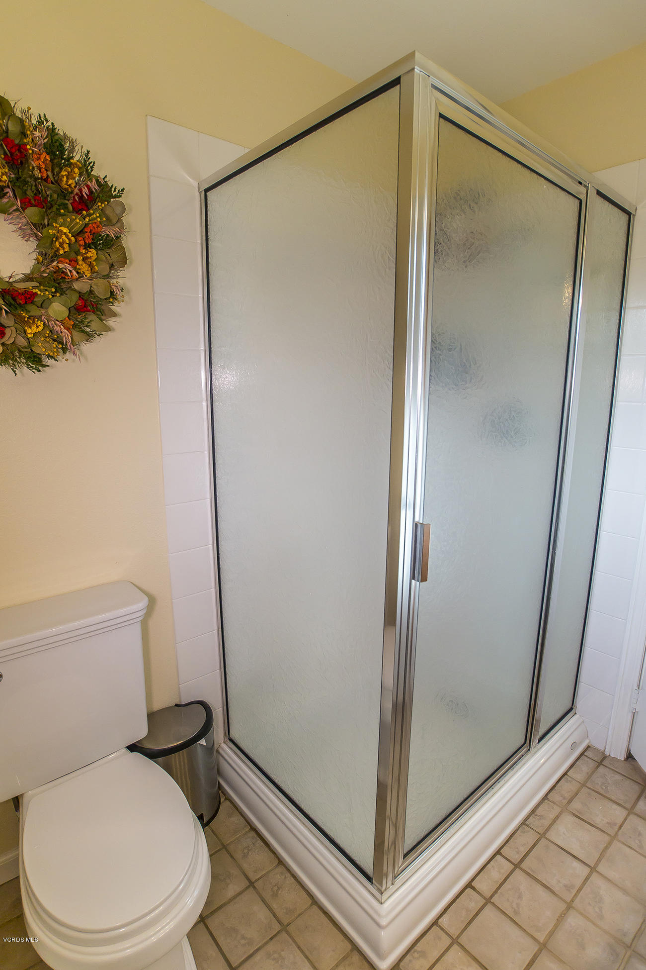 1333 Rambling Road Simi Valley, CA 93065 - Photo 40 of 49 a white toilet sitting next to a shower