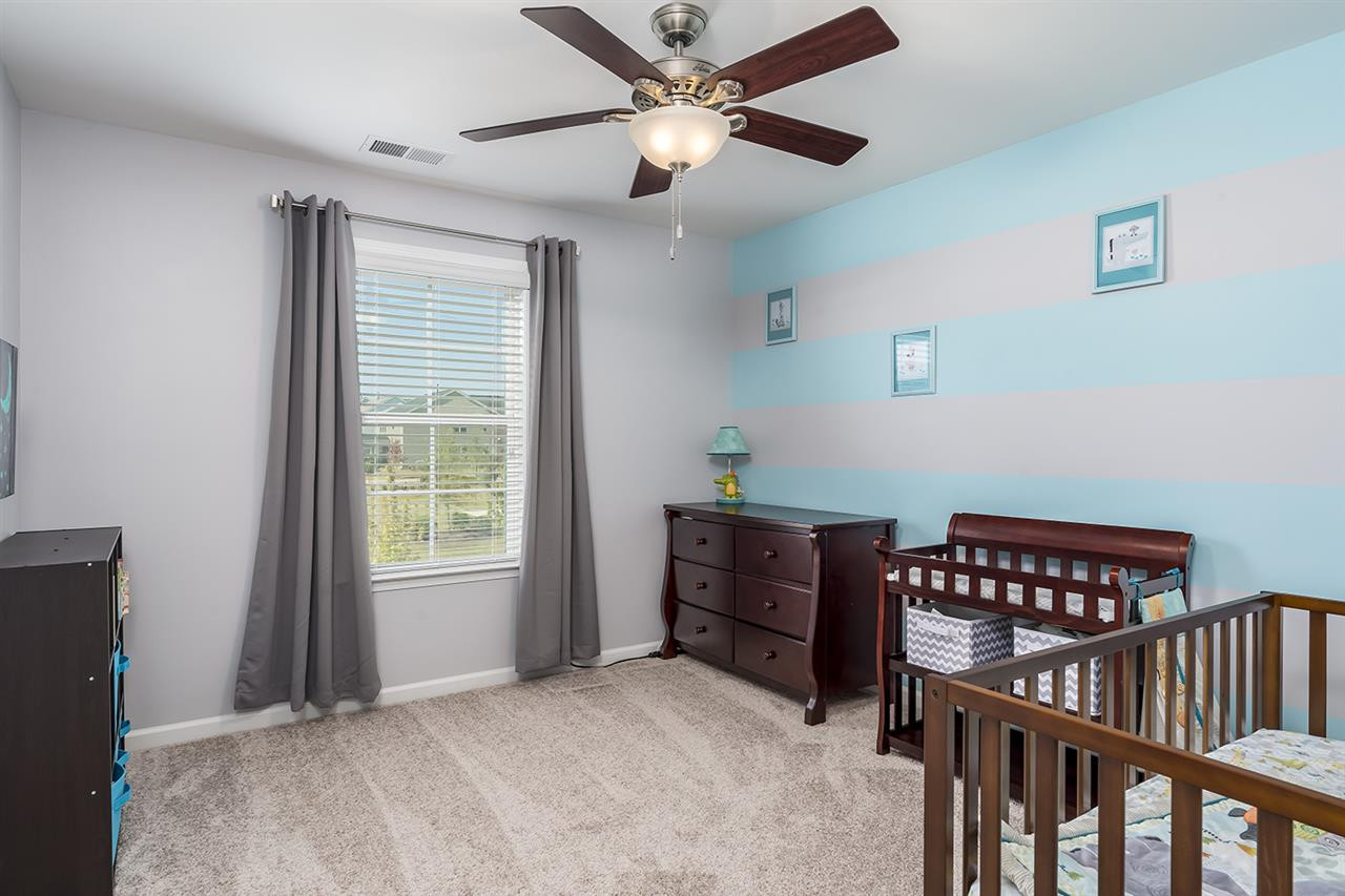 312 Morgan Ridge Road Holly Springs, NC 27540 - Photo 16 of 30 Bedroom 3 with Walk-In Closet