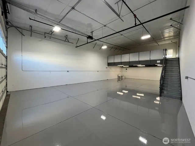 a bathroom with a shower and a toilet