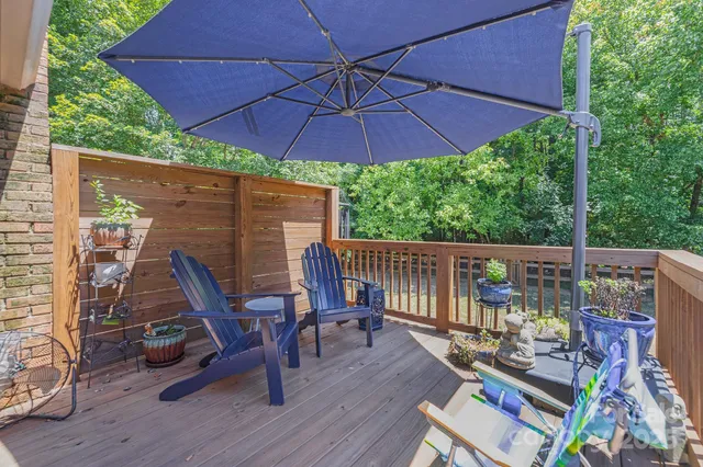 a view of a chair and table on the wooden floor