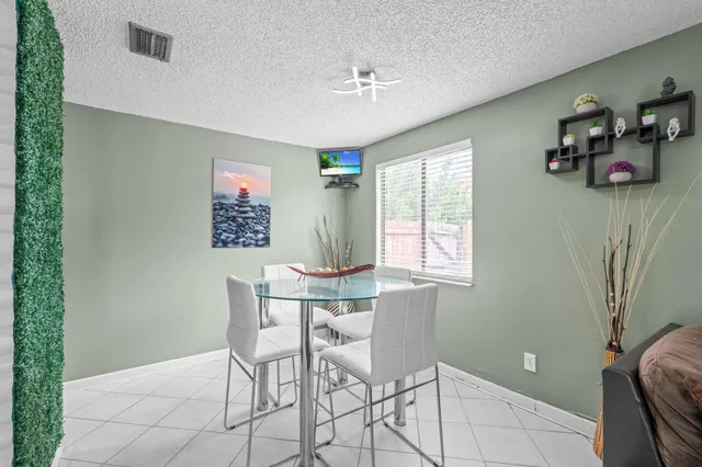 a workspace with furniture and window