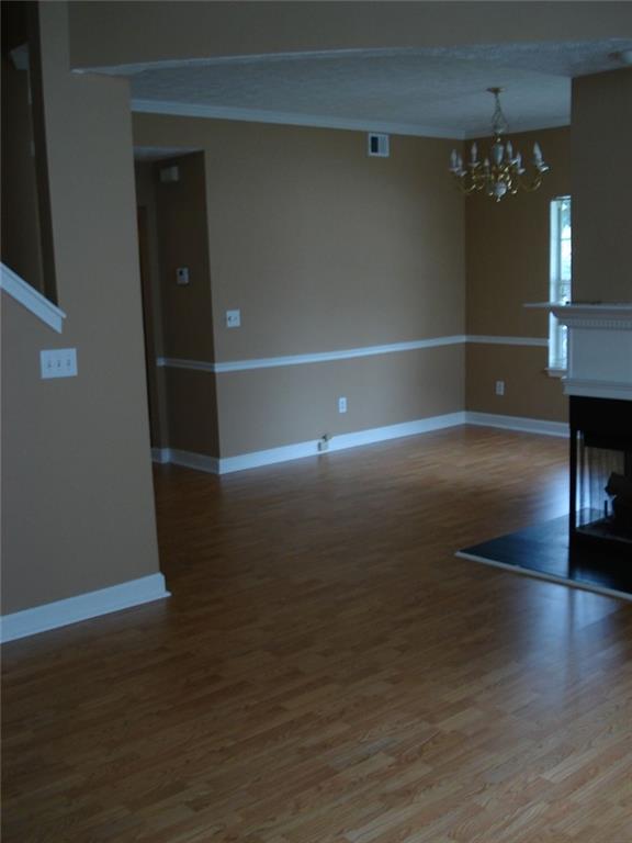 61 Hammock Place Southeast Atlanta, GA 30312 - Photo 4 of 12 a view of empty room with wooden floor