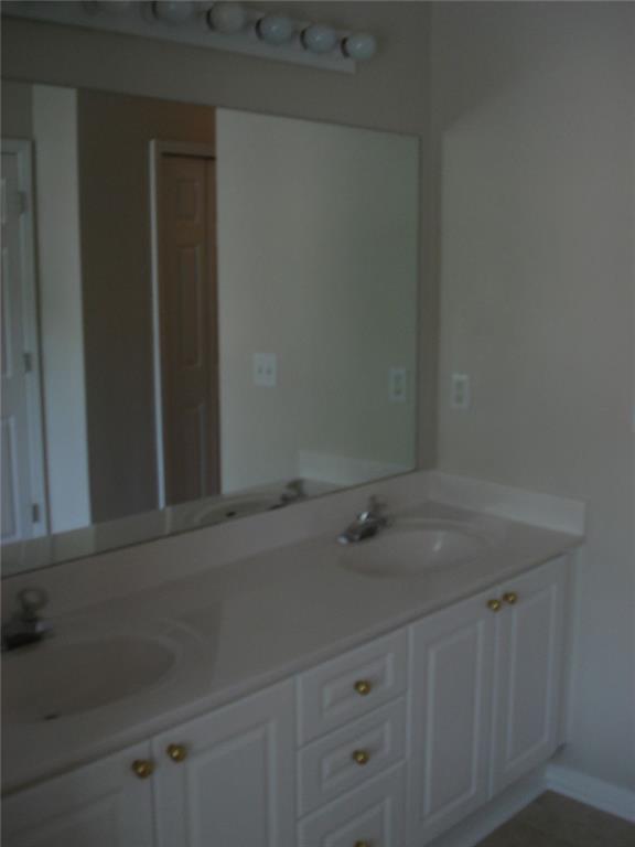 61 Hammock Place Southeast Atlanta, GA 30312 - Photo 9 of 12 a bathroom with a sink and vanity