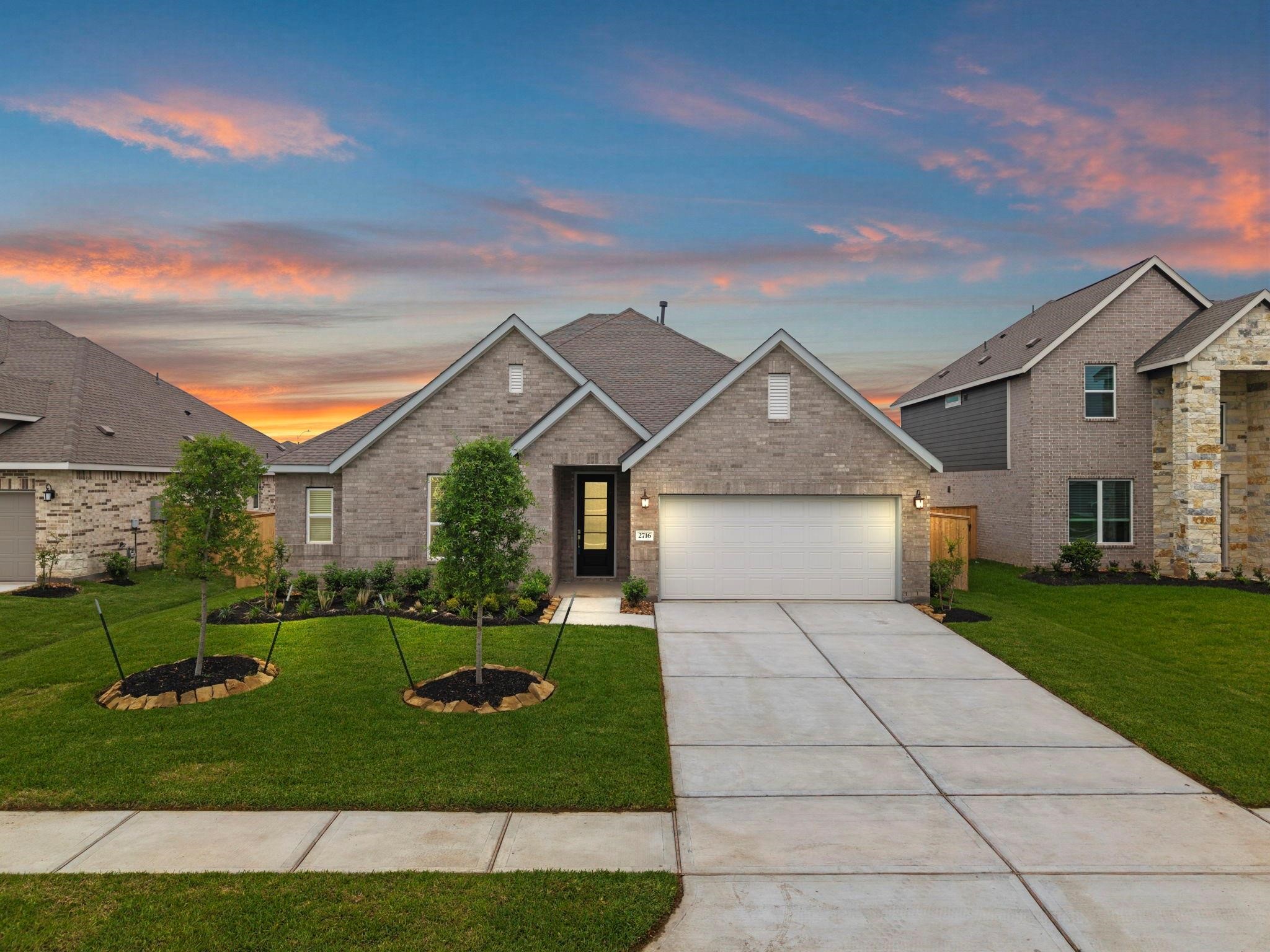 2716 Pine Bluff Drive Rosenberg, TX 77469 - Photo 1 of 32 a front view of house with yard and green space