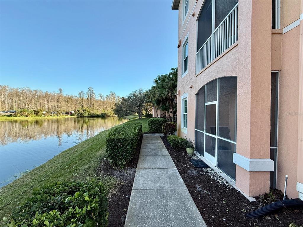 13572 Turtle Marsh Loop, Unit 212 Orlando, FL 32837 - Photo 19 of 20 a narrow alley leading to a building