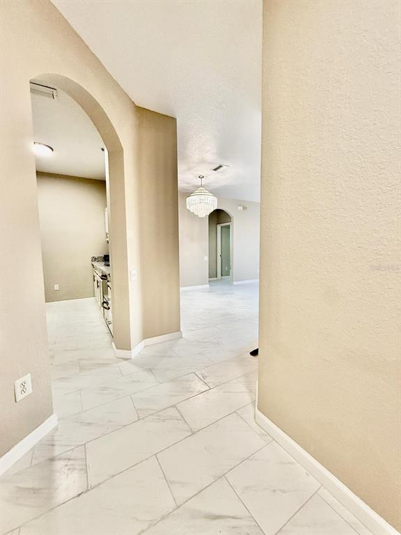 13572 Turtle Marsh Loop, Unit 212 Orlando, FL 32837 - Photo 3 of 20 a view of a bathroom with a shower