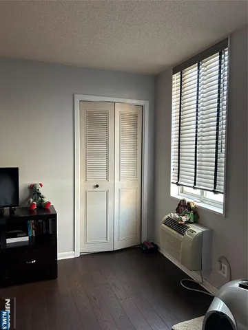 a room with furniture and a window