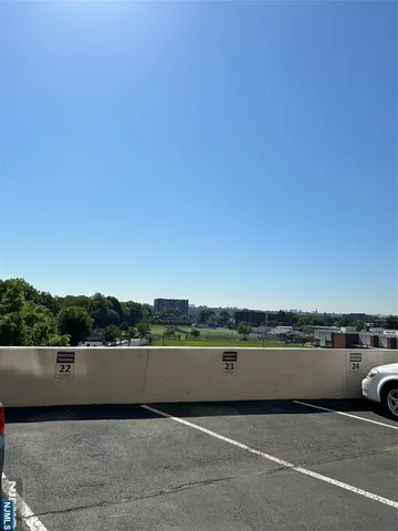 a view of a swimming pool and lake