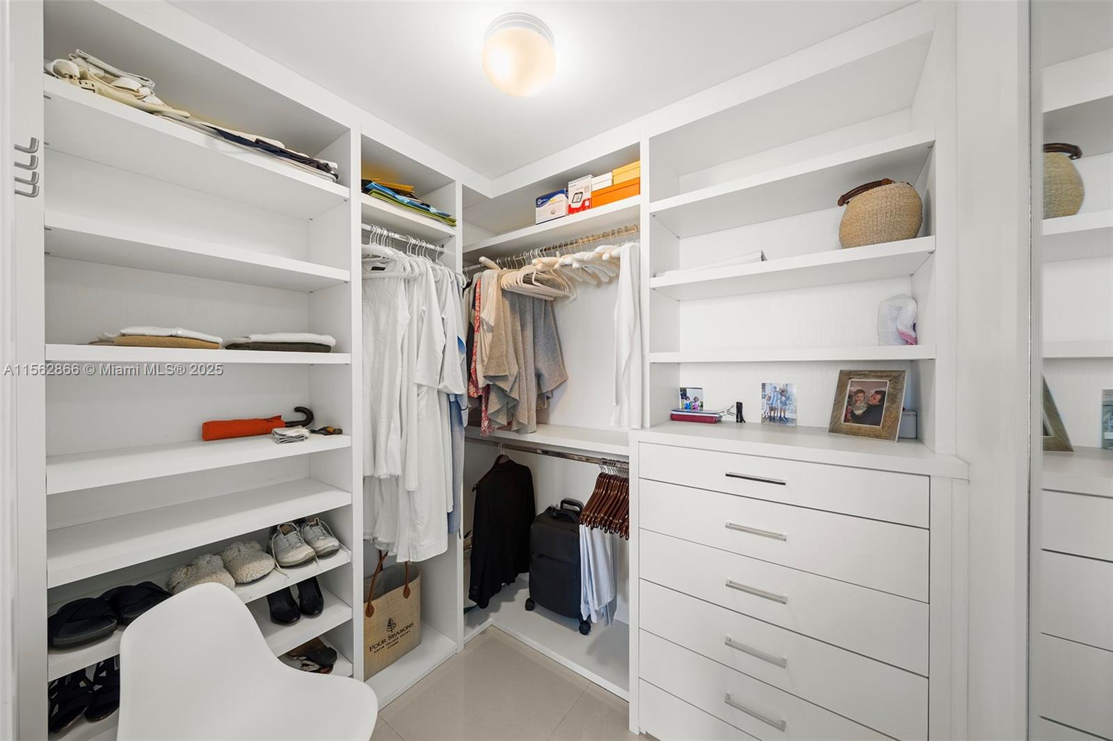 360 Ocean Drive, Unit 905S Key Biscayne, FL 33149 - Photo 14 of 43 His & Hers walk-in closet