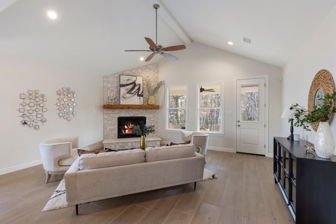 3223 Tamy Lane Brenham, TX 77833 - Photo 15 of 50 a living room with furniture and a fireplace