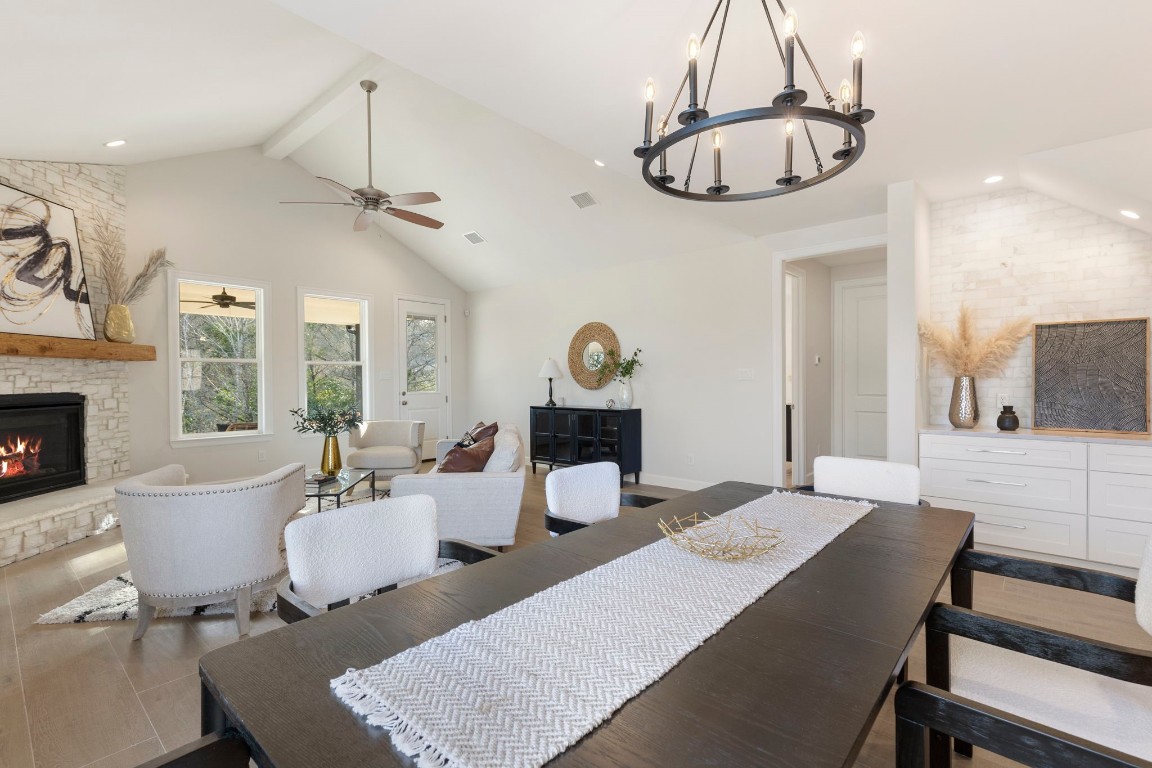 3223 Tamy Lane Brenham, TX 77833 - Photo 21 of 50 a view of a dining room with furniture a chandelier and wooden floor