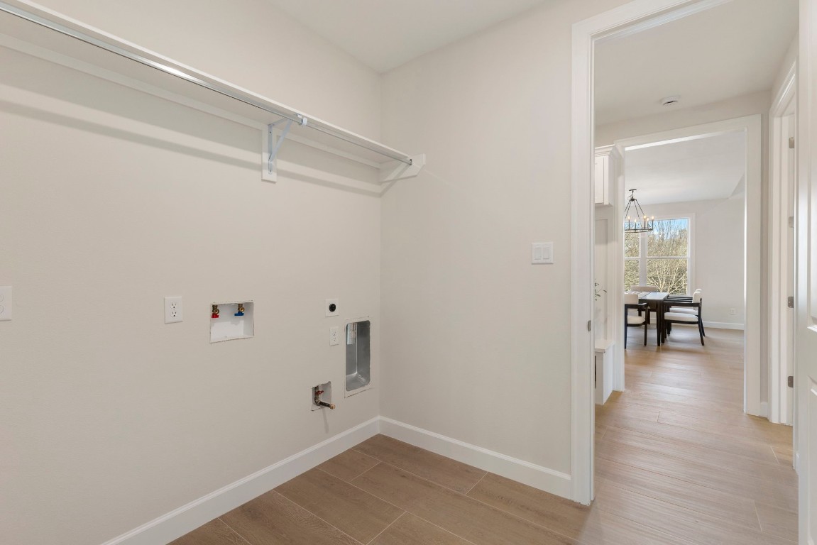 3223 Tamy Lane Brenham, TX 77833 - Photo 33 of 50 a view of a room with wooden floor