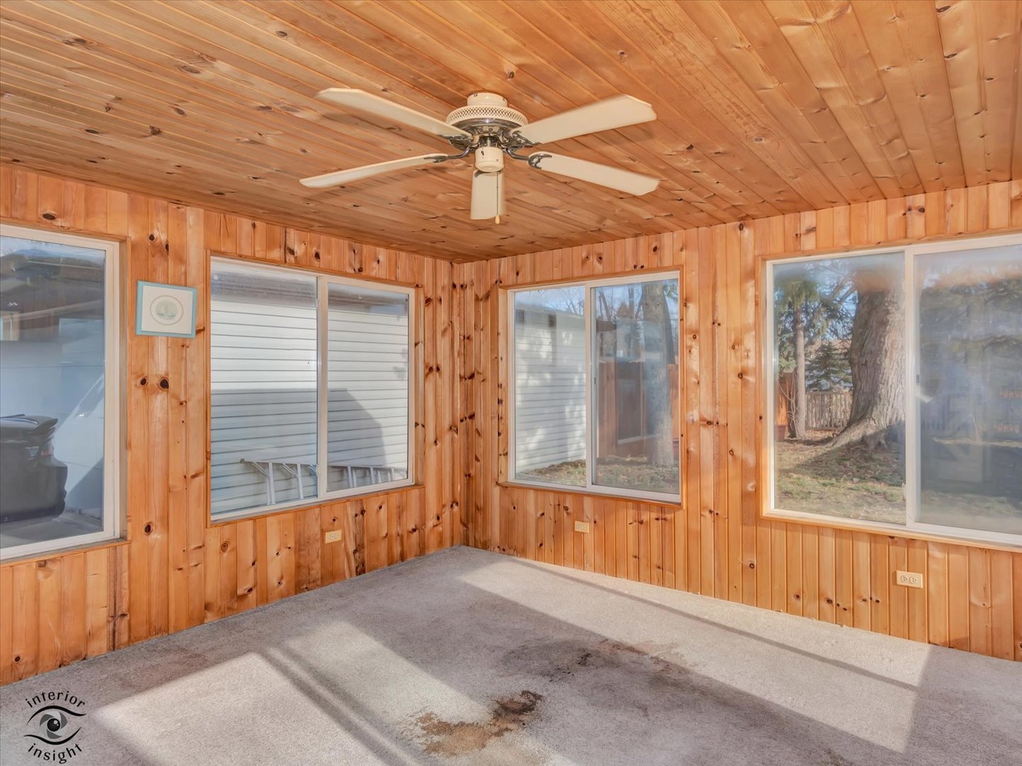 15043 Tripp Avenue Midlothian, IL 60445 - Photo 13 of 16 a view of a room with a ceiling fan and window