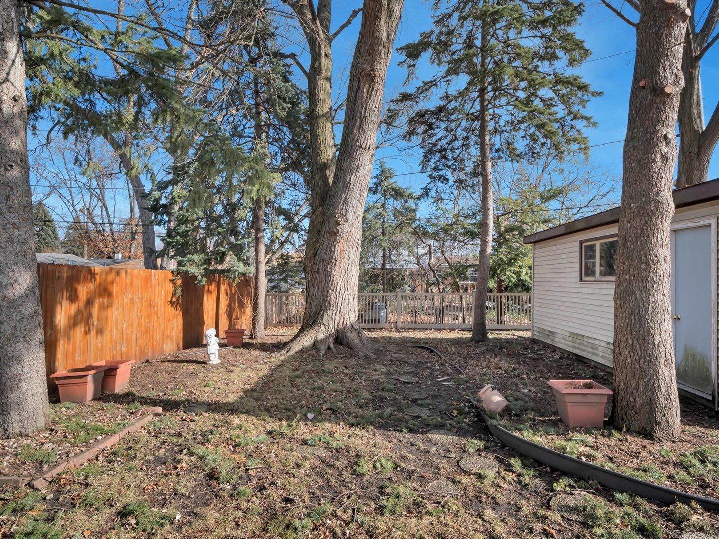 15043 Tripp Avenue Midlothian, IL 60445 - Photo 15 of 16 a backyard of a house with lots of green space