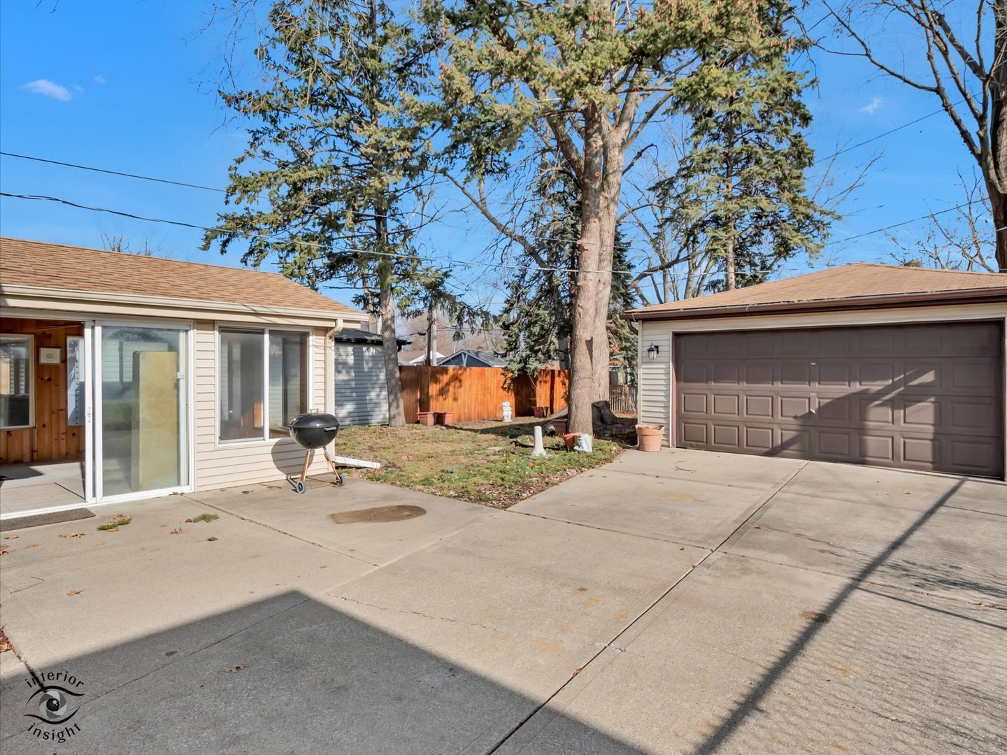 15043 Tripp Avenue Midlothian, IL 60445 - Photo 16 of 16 a house with trees in front of it