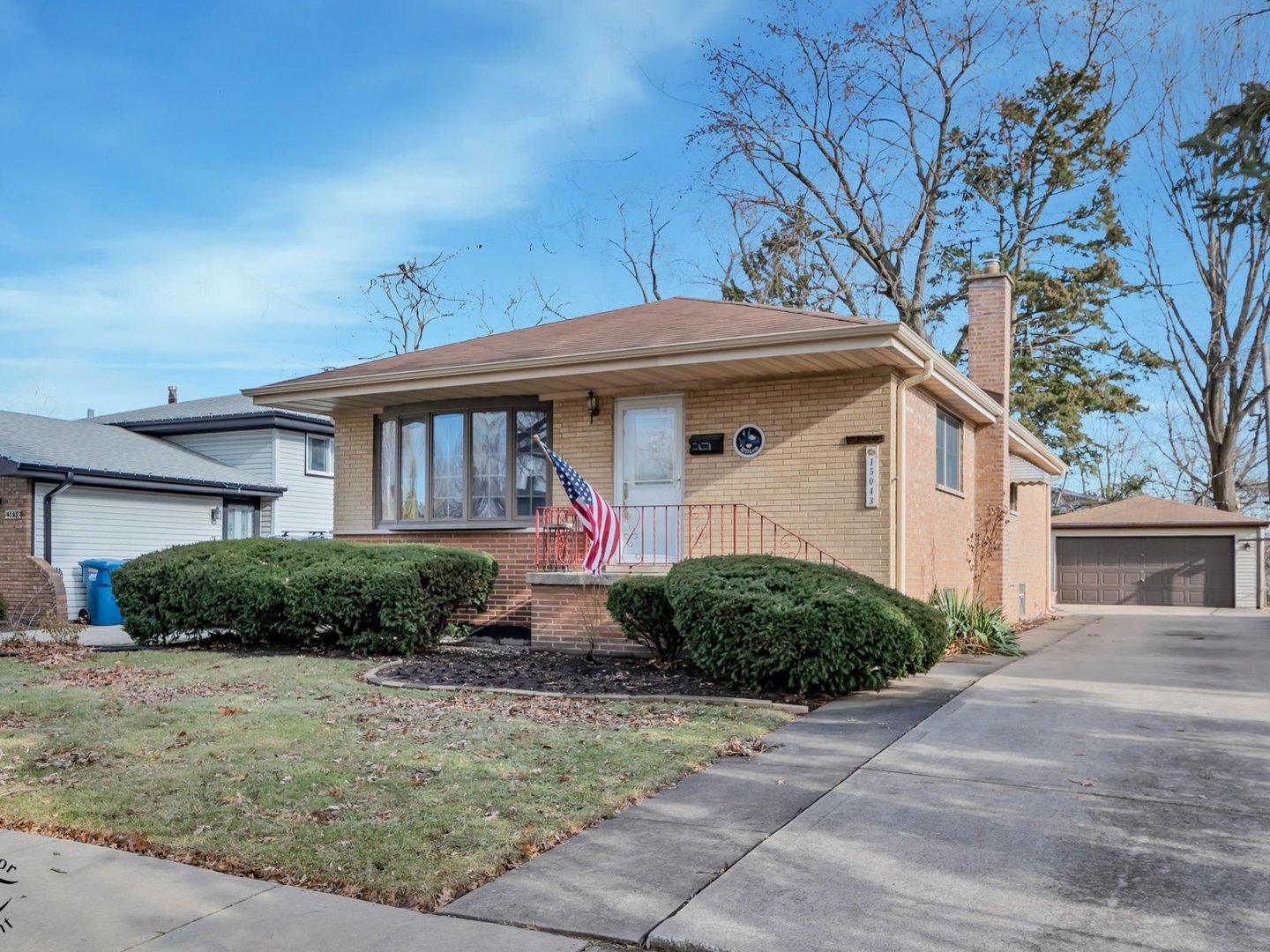 15043 Tripp Avenue Midlothian, IL 60445 - Photo 2 of 16 a front view of a house with garden