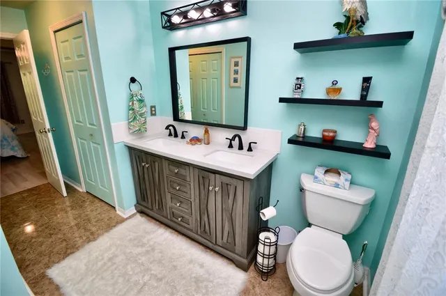 a bathroom with a shower and a toilet