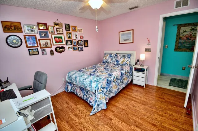 a bathroom with a sink toilet and mirror