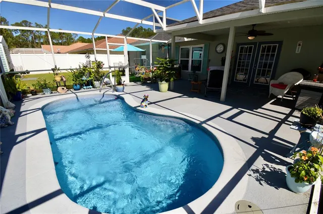 a view of swimming pool from a balcony