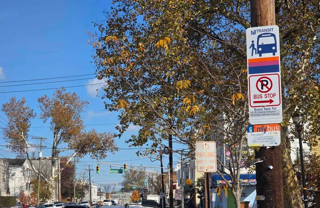 a street sign on a pole on a street