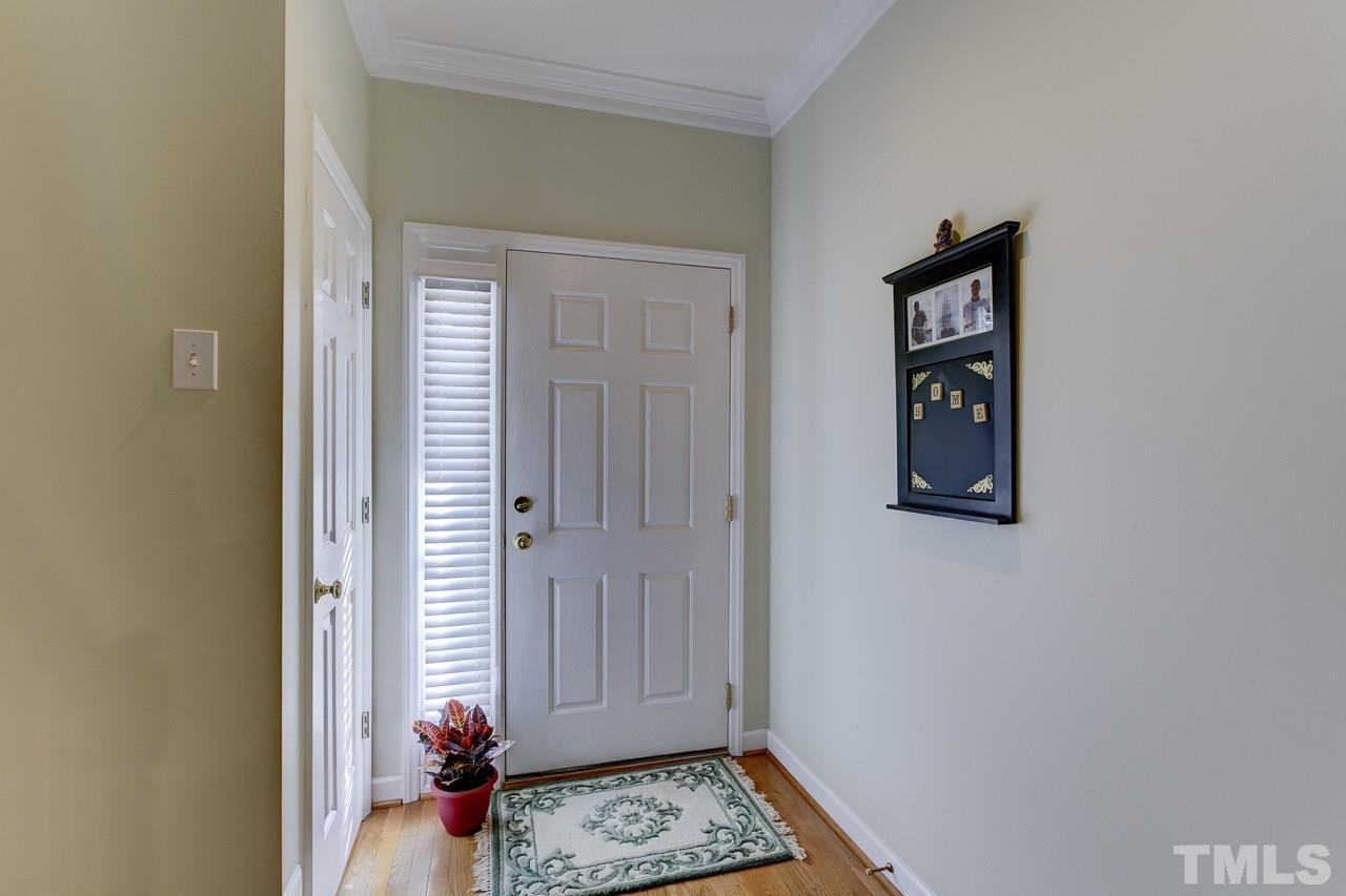 5410 Goldenglow Way Raleigh, NC 27606 - Photo 3 of 24 a view of room with window and wooden floor
