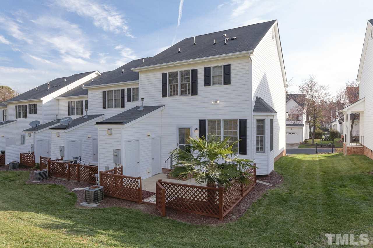 5410 Goldenglow Way Raleigh, NC 27606 - Photo 24 of 24 a front view of a house with a garden
