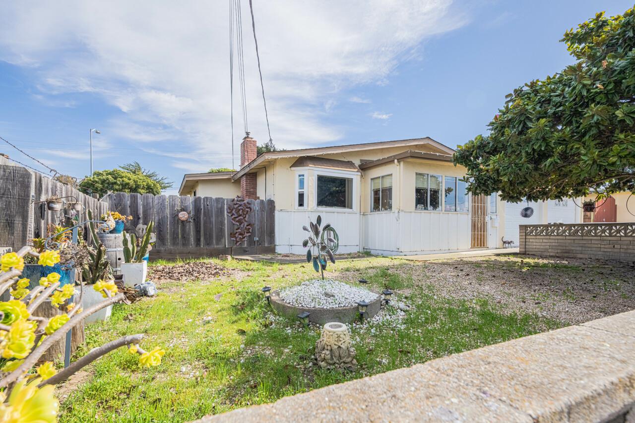 3100 Flower Circle Marina, CA 93933 - Photo 2 of 5 a backyard of a house with yard table and chairs
