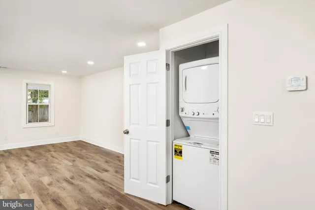 a view of a storage & utility room with a window