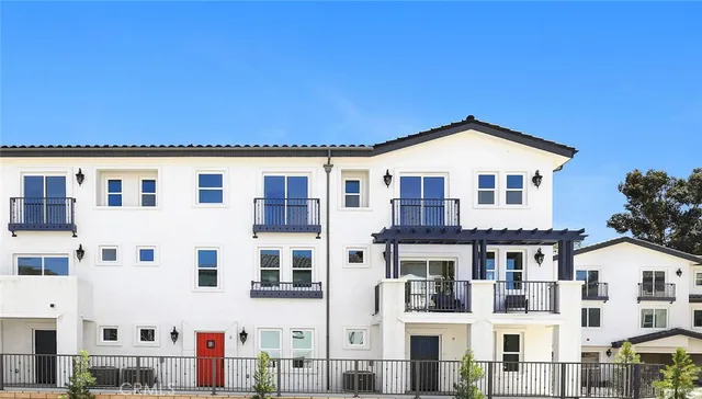 a front view of a large residential apartment building
