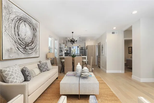 a spacious bedroom with a large bed and a large window