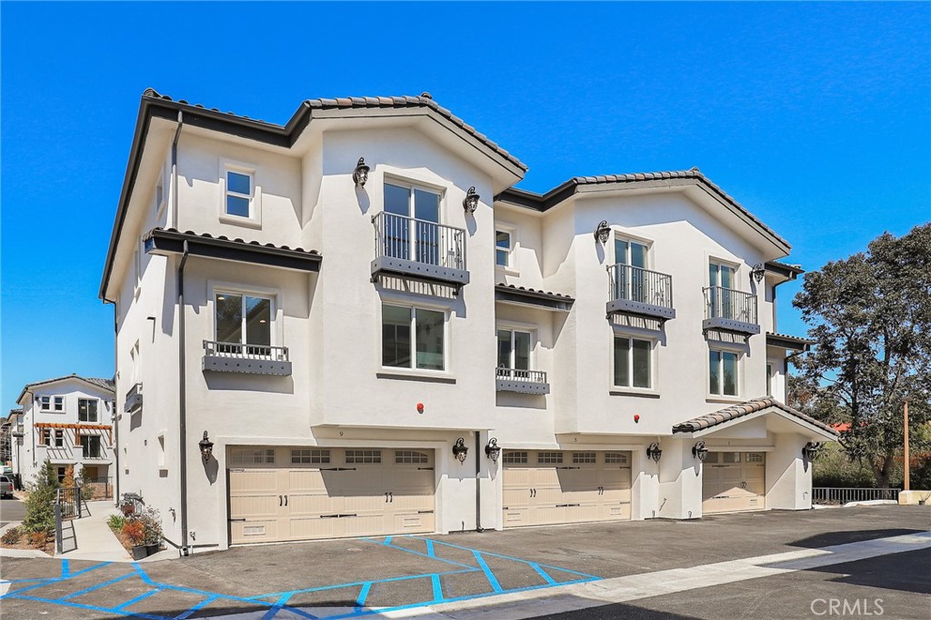 1 Spyglass Avenue Phillips Ranch, CA 91766 - Photo 4 of 63 a front view of a large white building