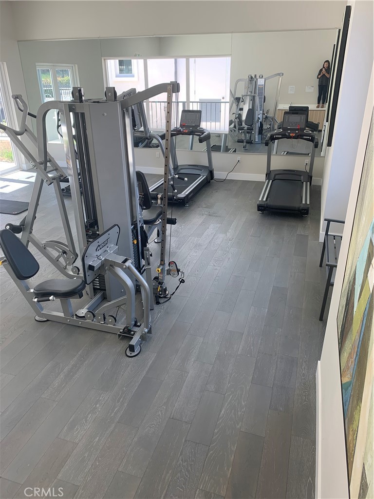 1 Spyglass Avenue Phillips Ranch, CA 91766 - Photo 62 of 63 a view of a room with gym equipment