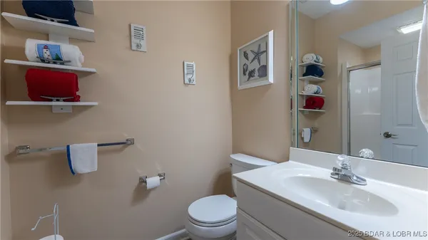 $450,000 | 73 Evergreen Condo Drive, Unit 2A, Sunrise Beach, MO 65079