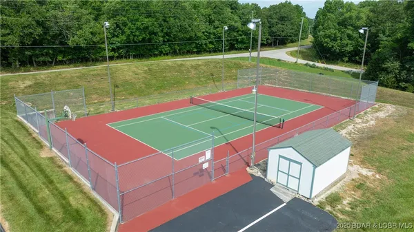 $450,000 | 73 Evergreen Condo Drive, Unit 2A, Sunrise Beach, MO 65079