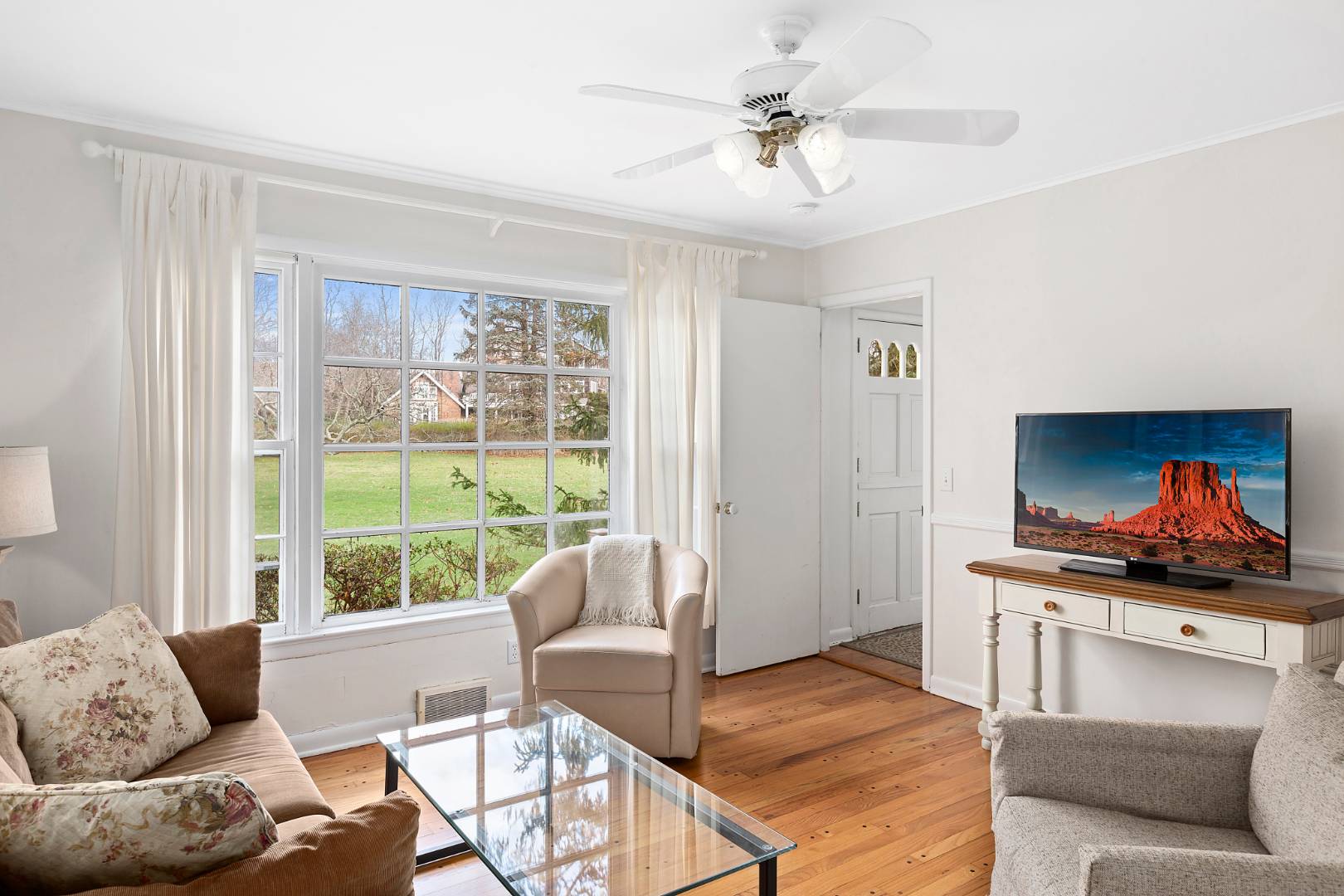 69 Ferry Road Sag Harbor, NY 11963 - Photo 9 of 17 a living room with furniture and a window